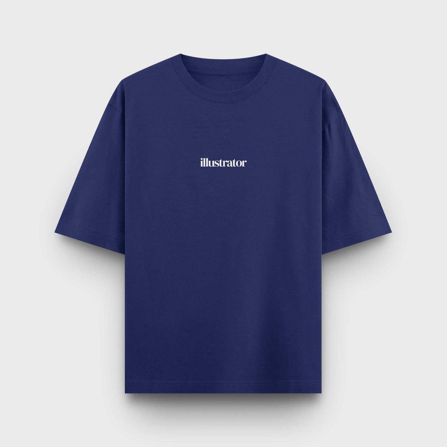 Navy blue oversized t-shirt with "ILLUSTRATOR" printed in white minimalist text at the center.